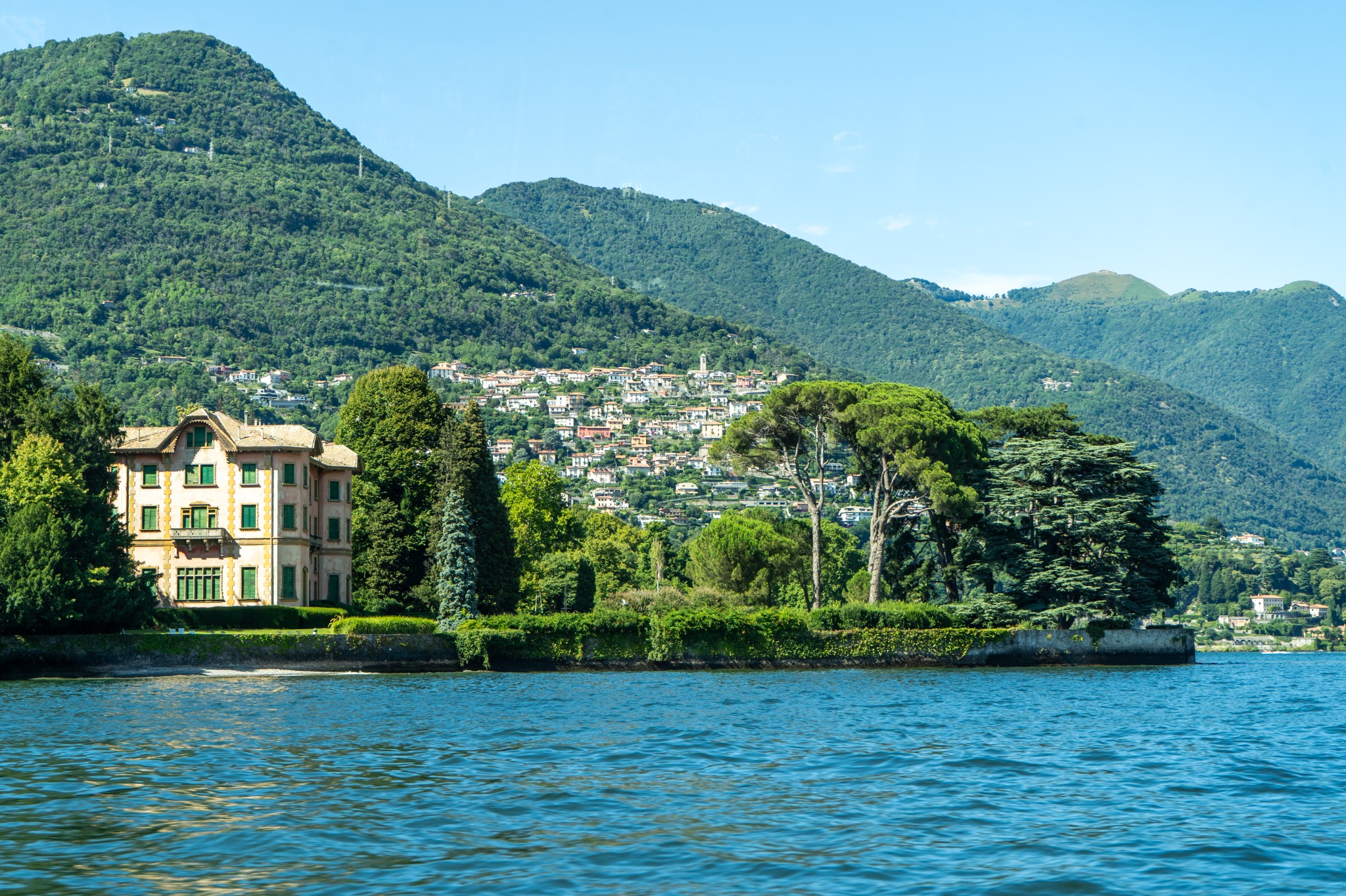 Lakeside villa and wooded hills, Lake Como